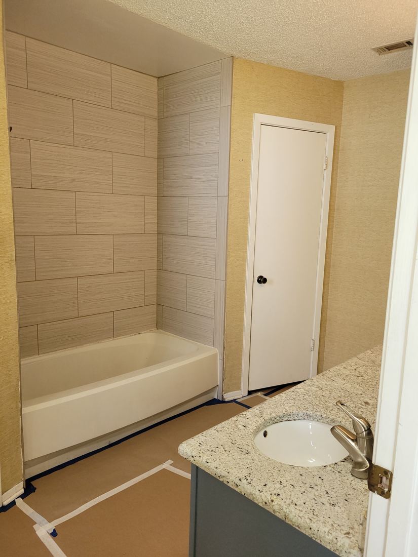 Before: Tub to shower